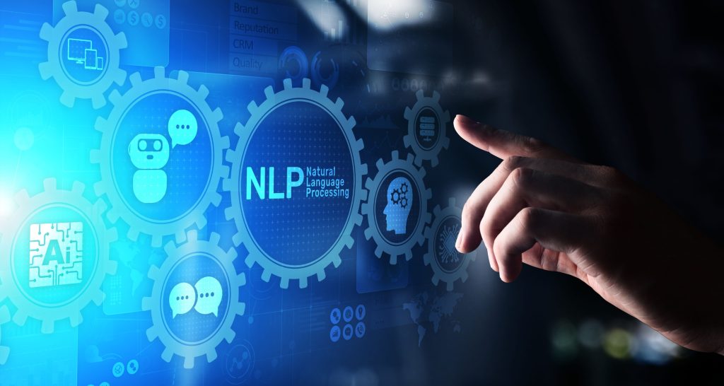 پردازش زبان طبیعی چیست؟ بررسی کامل مفاهیم و کاربردهای NLP 3 دست یک شخص در حال لمس تصویر اسکریم که ر روی آن نوشته شده nlp